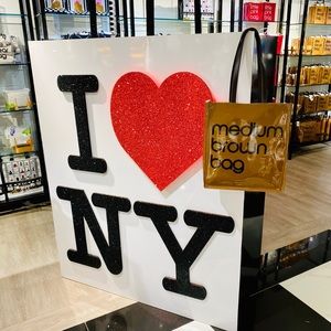 NWT Bloomingdale’s plastic medium brown bag